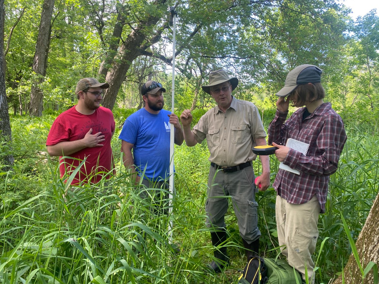 Stephen Frantz, Harrison Frantz, Tom Biebighauser, and Michelle Herman discuss a wetland design project in the Hudson Valley